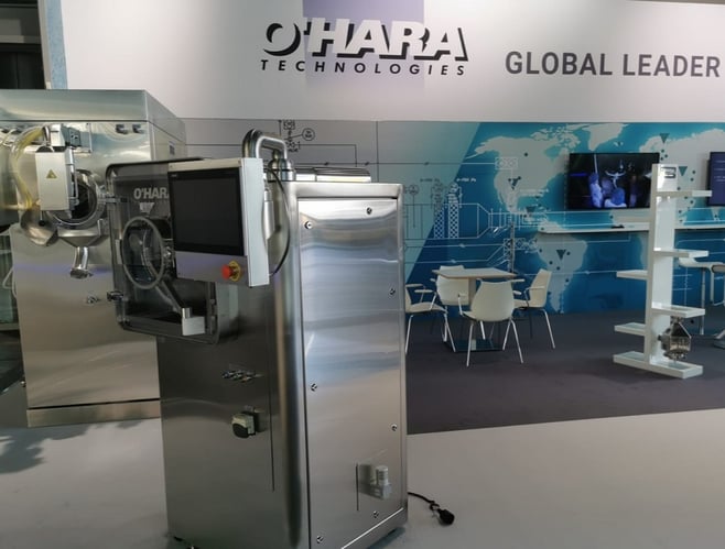 Ausstellung von originalen Maschinen auf dem Messestand von O'Hara Technologies